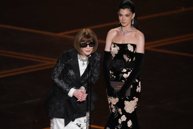 Anna Wintour and Anne Hathaway on stage at the 2026 Oscars