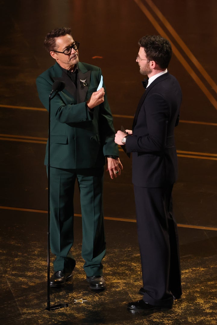 Downey Jr. offers Chris Evans his valet ticket as a gift.