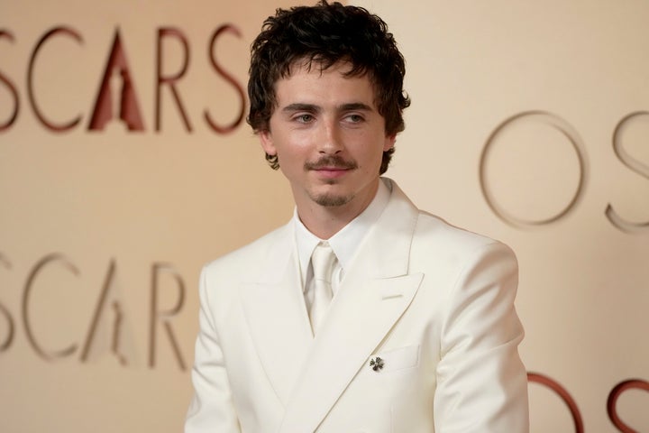Timothée Chalamet appeared at the 2026 Oscars on Sunday in an all-white Givenchy suit, wide-leg pants, and matching shoes. 