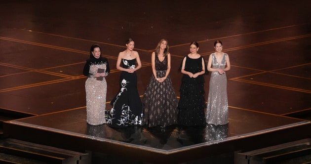 Melissa McCarthy, Rose Byrne, Kristen Wiig, Maya Rudolph and Ellie Kemper on stage at the 2026 Oscars