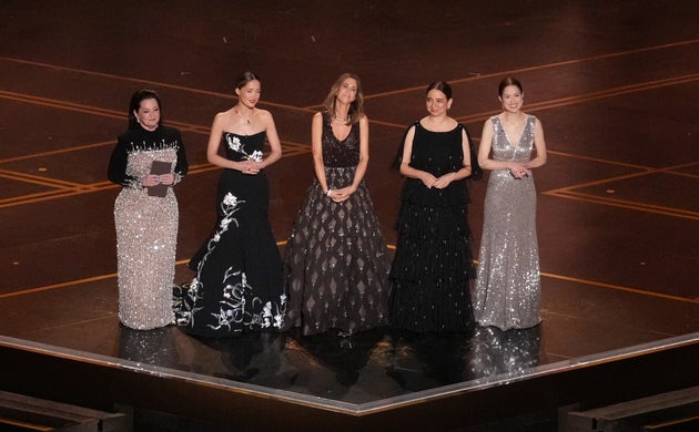 Melissa McCarthy, Rose Byrne, Kristen Wiig, Maya Rudolph and Ellie Kemper on stage at the 2026 Oscars
