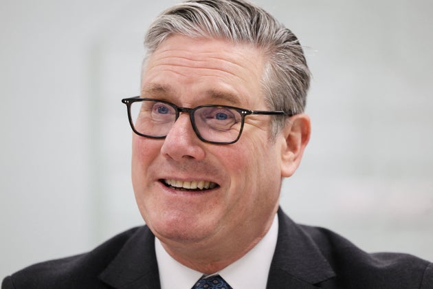 Keir Starmer reacts as he meets student researchers at Tyndall National Institute in Cork last Friday.