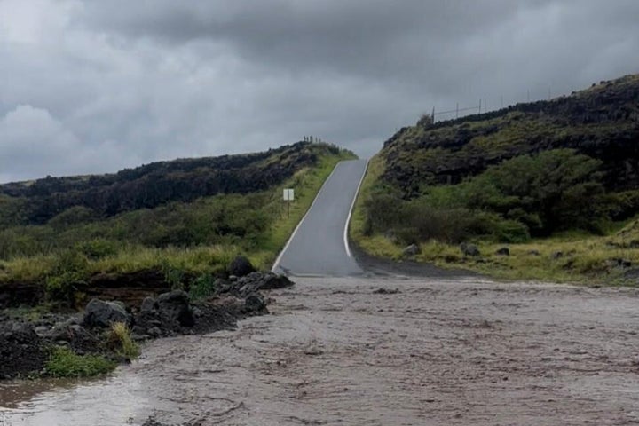 This photo provided by Maui County shows flooding from days of downpours in Hana, Hawaii, on Friday, March 13, 2026.