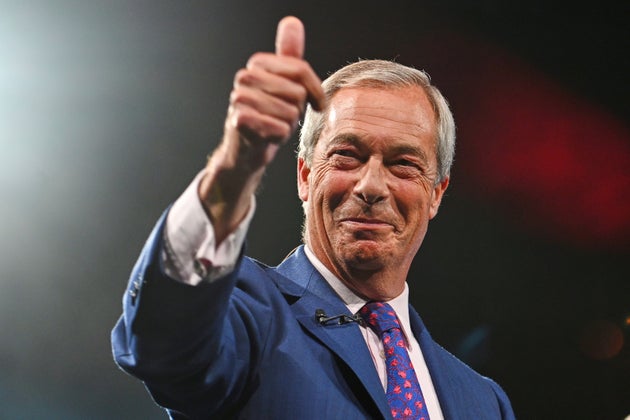 Britain's Reform UK party leader Nigel Farage reacts during the Reform party's annual conference at the National Exhibition Centre in Birmingham, England, Saturday, Sept. 6, 2025.