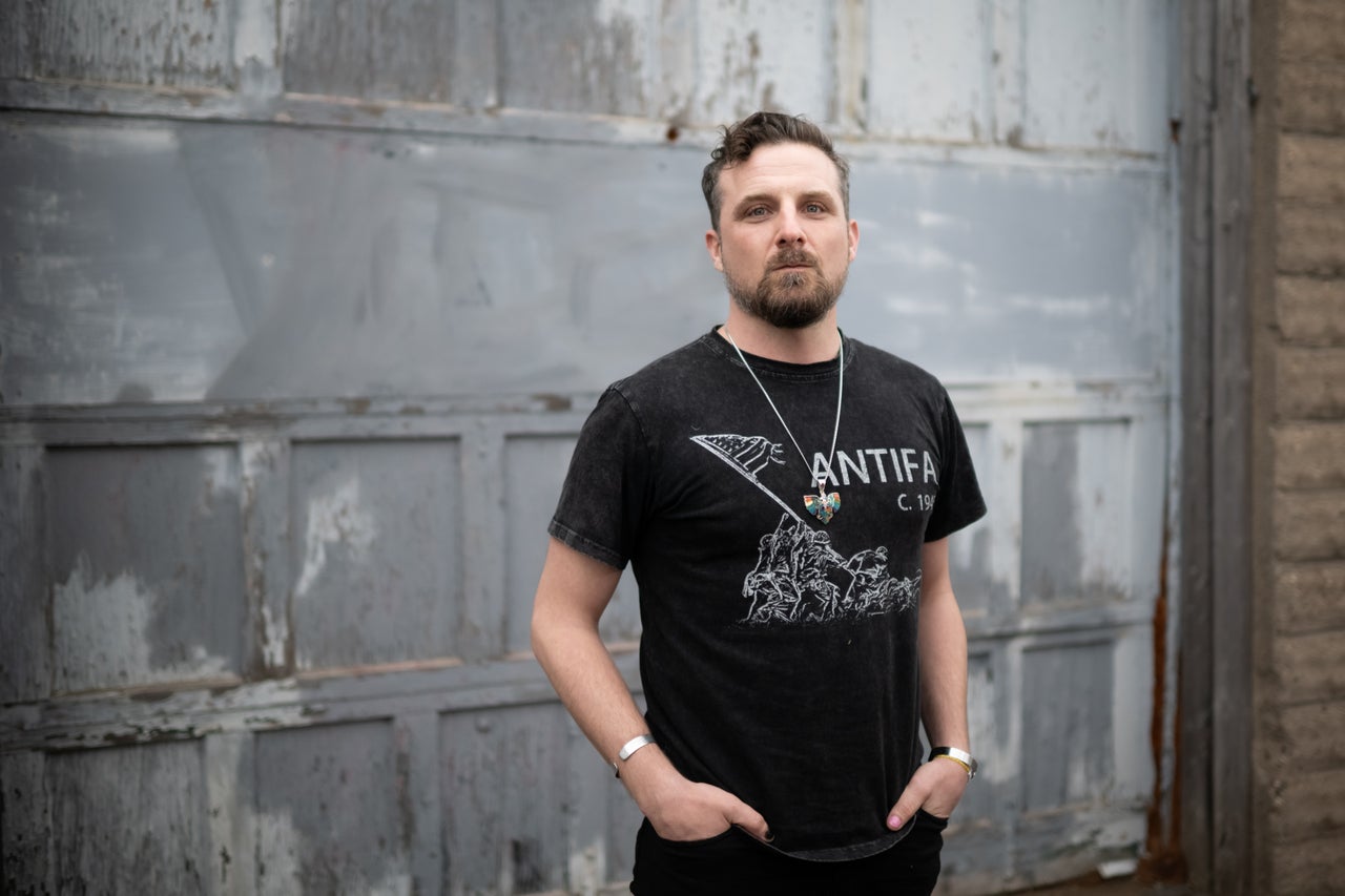Army veteran Ian Austin poses for a portrait in Minneapolis on March 6, 2026. He said that by protesting against ICE, he was “standing up for those very same things that I thought I was going to war for.” 