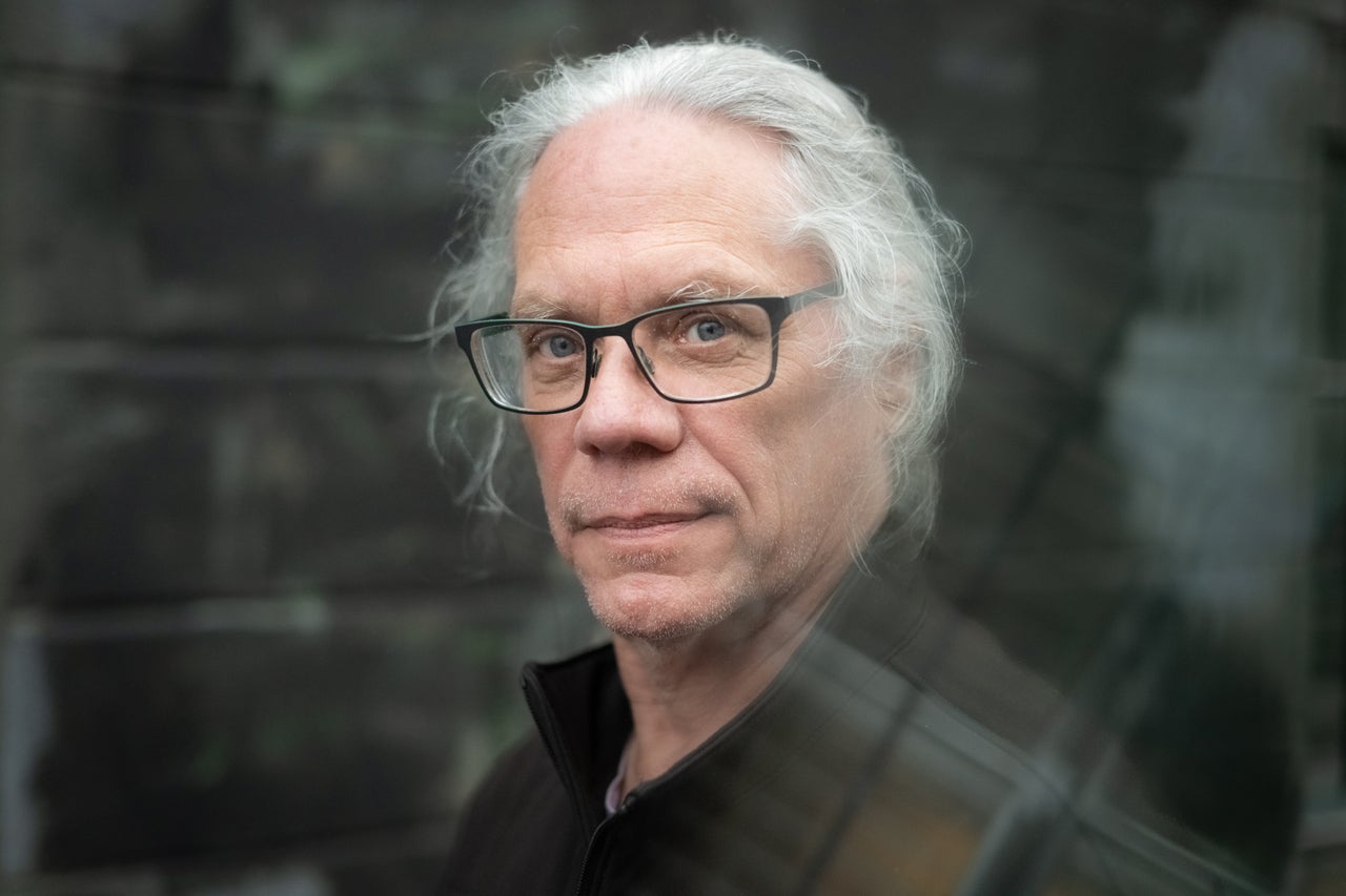 Journalist Brixton Hughes poses for a portrait in Minneapolis on March 6, 2026. Hughes says that the charges against him have “put that fear in me” and made him more hesitant to cover his beat. 