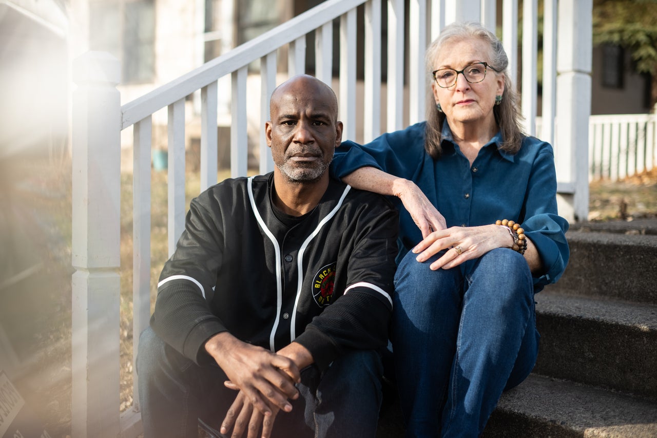 Activists (L-R) Trahern Crews and Cheryl Persigehl pose for a portrait in Minneapolis on March 9, 2026. "We have very effective grassroots leadership here, and I think this indictment is a way to silence and slow down that leadership," Crews said.