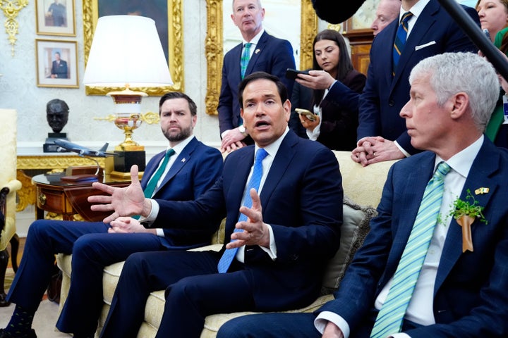 Secretary of State Marco Rubio answers a question about Cuba during a meeting between President Donald Trump and Irish Prime Minister Micheál Martin in the Oval Office of the White House, on St. Patrick's Day, Tuesday, March 17, 2026, in Washington. (AP Photo/Alex Brandon)