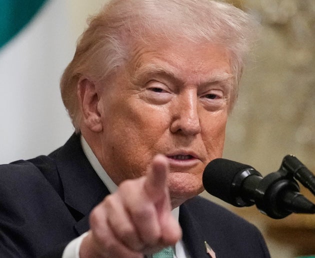 President Donald Trump speaks before Ireland's Prime Minister Micheál Martin presents him with a bowl of shamrocks during a St. Patrick's Day event in the East Room of the White House, Tuesday, March 17, 2026, in Washington. 