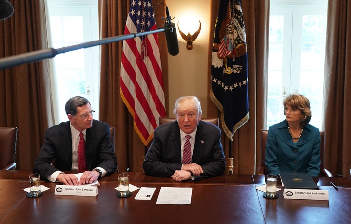 Murkowski sits next to Trump during a meeting with bipartisan members of Congress on infrastructure in the Cabinet Room of the White House in 2018 in Washington, D.C.