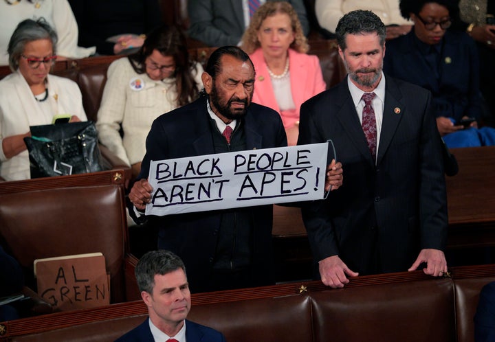 Rep. Al Green (D-Texas) photographed holding up a protest sign as Trump delivered his State of the Union address on Feb. 24, 2026, in Washington, DC.