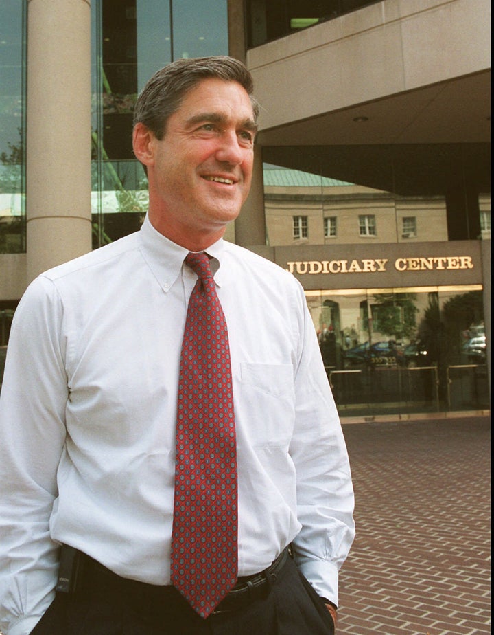 U.S. Attorney Robert Mueller III stands outside his office building in Washington in this Aug. 8, 1996 photo. 