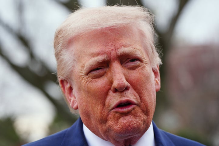President Donald Trump speaks with reporters before departing on Marine One from the South Lawn of the White House, Friday, March 20, 2026, in Washington. (AP Photo/Alex Brandon)