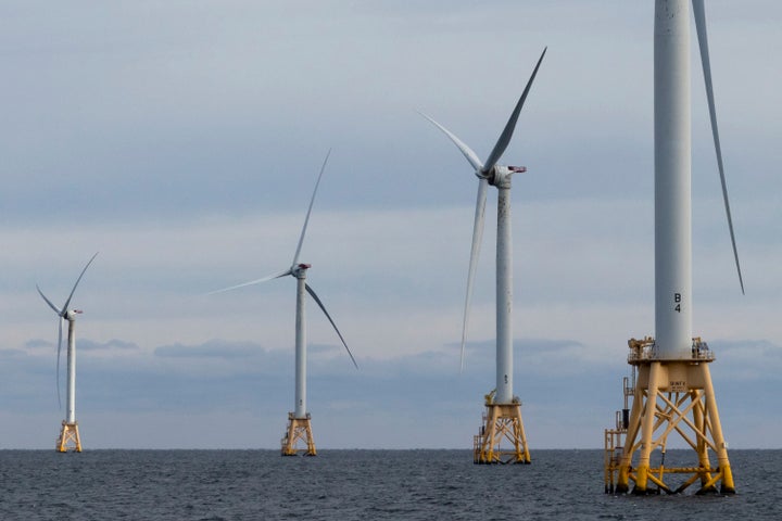 The Block Island Wind Farm's five turbines operate Thursday, Dec. 7, 2023, off the coast of Block Island, Rhode Island, during a tour hosted by Orsted. (AP Photo/Julia Nikhinson)