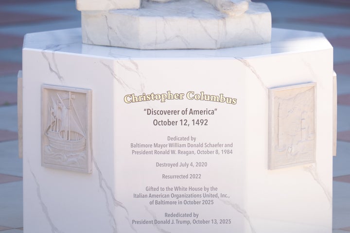 A statue of Christopher Columbus stands in front of the Eisenhower Executive Office Building in the White House complex.