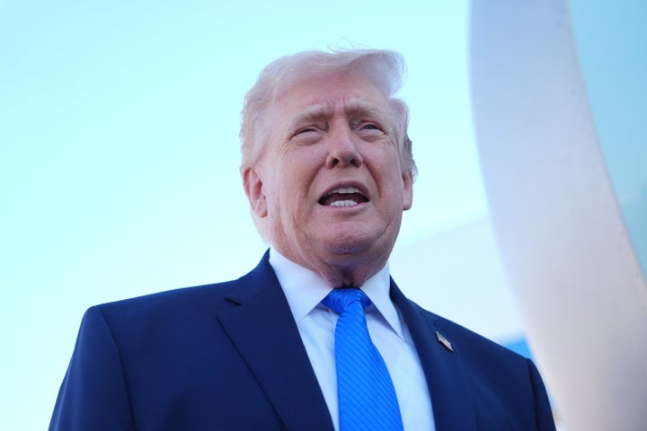 President Donald Trump speaks to the media before boarding Air Force One on March 23, 2026 at Palm Beach International Airport in West Palm Beach, Florida.