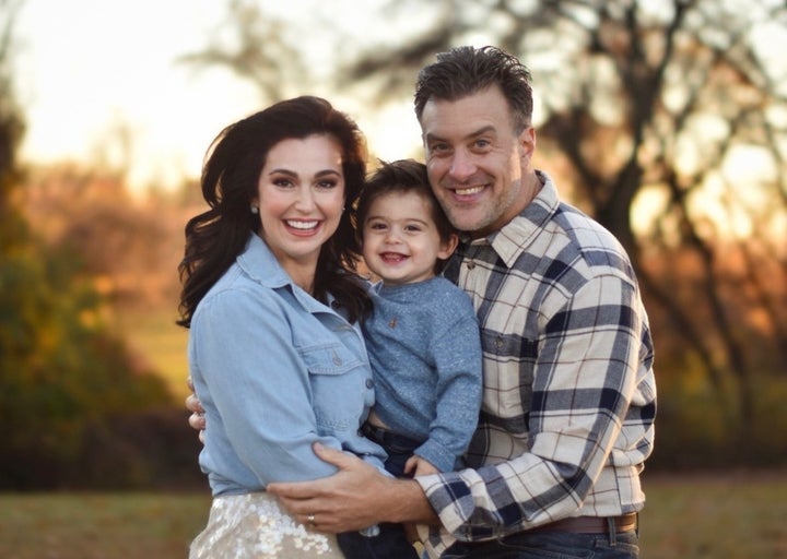 The author with her husband Tom and their 18-month-old son, Maverick.