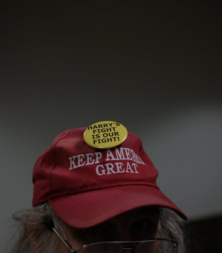 A supporter of Harry Wait wears a pin supporting Wait at the Racine County Courthouse in Racine, Wisconsin, on Oct. 7, 2022.