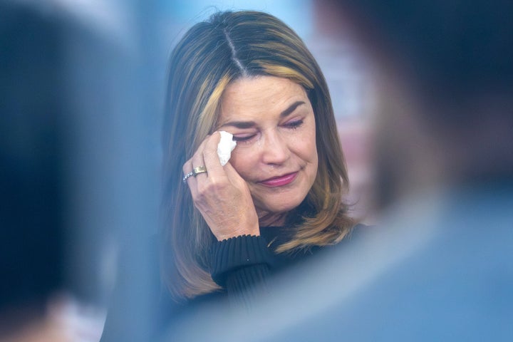 Savannah Guthrie wipes away tears as she visits the "Today" show set at New York's Rockefeller Plaza earlier this month.