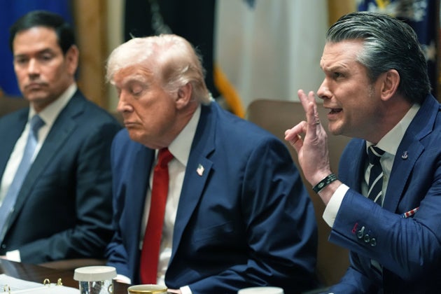 Defense Secretary Pete Hegseth speaks as President Donald Trump and Secretary of State Marco Rubio listen during a Cabinet meeting at the White House, Thursday, March 26, 2026, in Washington. 