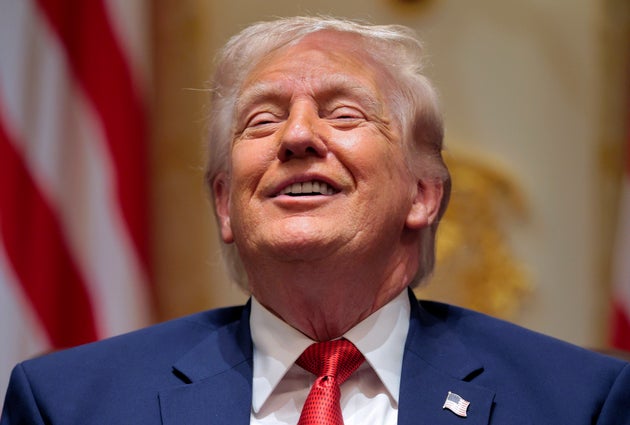 ホワイトハウスで行われた閣僚会議で反応を示すトランプ大統領（2026年3月26日）