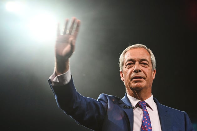 Britain's Reform UK party leader Nigel Farage waves during the Reform party's annual conference at the National Exhibition Centre in Birmingham, England, Saturday, Sept. 6, 2025.