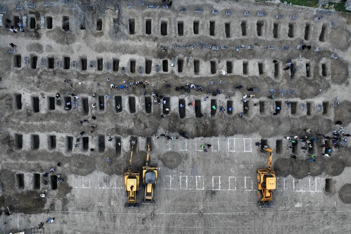 The coffins of students killed in an Israel-US attack on a girls' primary school are seen during a mass funeral ceremony in Minab, Hormozgan, Iran on March 3, 2026. (Photo by Stringer/Anadolu via Getty Images)