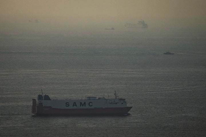 Cargo ships sail in the Arabian Gulf towards Strait of Hormuz in United Arab Emirates, Thursday, March 19, 2026. (AP Photo)