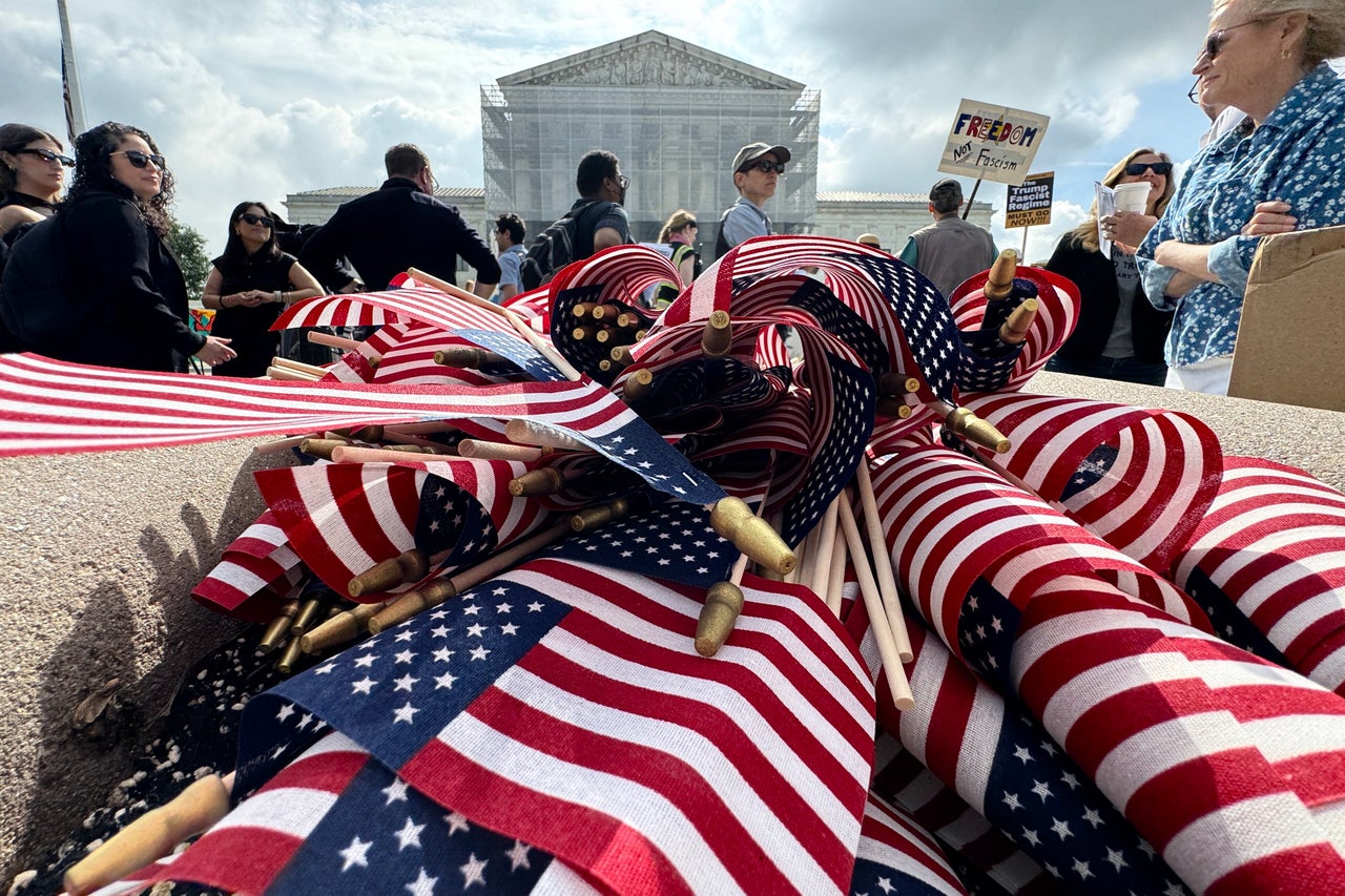 American flags are seen during a protest outside the U.S. Supreme Court over President Donald Trump’s move to end birthright citizenship as the court hears arguments over the order in Washington, D.C., on May 15, 2025. Trump issued an executive order on his first day in office seeking to limit birthright citizenship for children whose parents are in the United States illegally or on temporary visas, but it has been blocked in multiple appellate courts. He appealed the case to the Supreme Court on March 13.