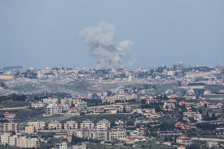 A photograph taken from the southern Lebanese area of Marjayoun shows smoke rising from the site of an Israeli airstrike that targeted the village of Deir al-Zahrani on March 28, 2026. (Photo by AFP via Getty Images)