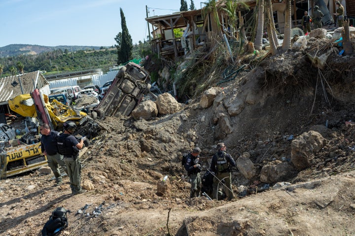 First responders gather near a crater left by an Iranian missile on March 28, 2026 in Beit Shemesh, Israel. (Photo by Erik Marmor/Getty Images)