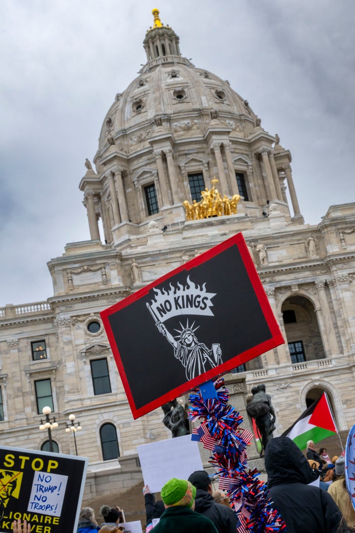 A "No Kings" sign is held up at the "No Trump, No Troops" protest in St. Paul, Minnesota on Oct. 25, 2025.