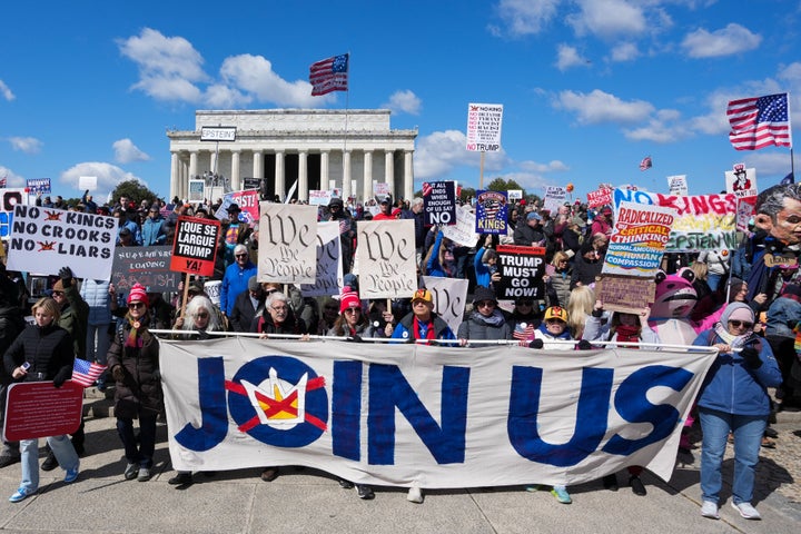 Demonstrators participate in the "No Kings" national day of protest near the Lincoln Memorial in Washington, D.C. 
