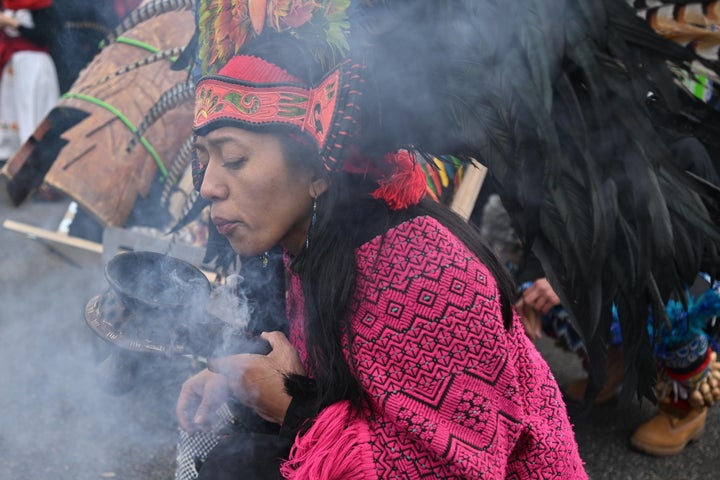 Maryanne Quiroz, lead dancer with Kalpulli Yaocenoxtli, performs at Western Park during the "No Kings" protest in St. Paul, Minnesota.