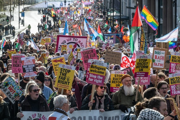 Protesters march down Piccadilly during the 'Together Against The Far Right' rally on March 28, 2026 in London, England. 
