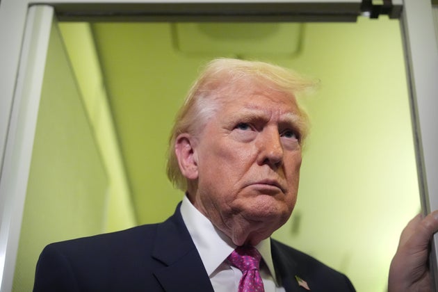 President Donald Trump speaks to reporters aboard Air Force One en route from West Palm Beach, Fla., to Joint Base Andrews, Md., Sunday, March 29, 2026.