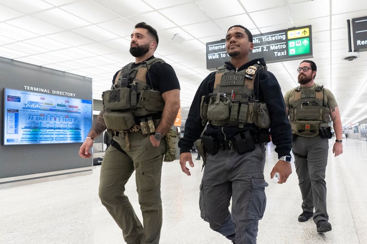 ICE agents patrol the Washington Dulles International Airport on March 24.