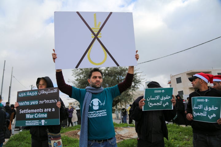 Demonstrators from Israeli and Palestinian communities attend an anti-death penalty protest in the occupied West Bank village of Beit Jala, on Dec. 19, 2025. On March 30, Israel's Knesset passed a widely condemned law making death by hanging the default punishment for Palestinian prisoners.