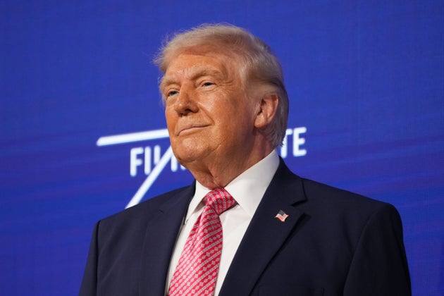 President Donald Trump takes the stage at the Future Investment Initiative Institute's summit, Friday, March 27, 2026, in Miami Beach, Fla.