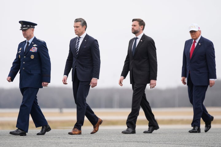 Chairman of the Joint Chiefs of Staff Gen. Dan Caine, Defense Secretary Pete Hegseth, Vice President JD Vance and President Donald Trump attend a casualty return for the soldiers who were killed in a drone strike at a command center in Kuwait.