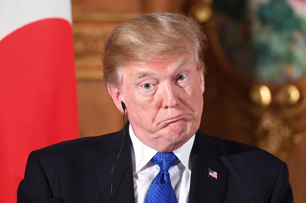 President Donald Trump gestures during a joint press conference with former Japanese Prime Minister Shinzo Abe at Akasaka Palace in Tokyo in 2017.