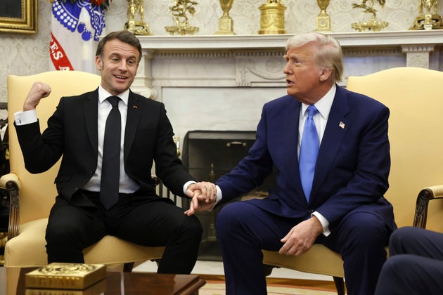 France's President Emmanuel Macron and President Donald Trump speak during a meeting in the Oval Office of the White House in Washington, Monday, Feb. 24, 2025. (Ludovic Marin/Pool via AP)