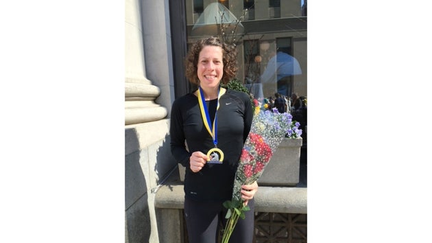The author's daughter at the finish line of the Boston Marathon in 2019.