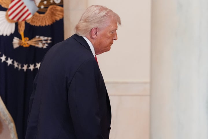 WASHINGTON, DC - APRIL 1: U.S. President Donald Trump departs after speaking about the Iran war from the Cross Hall of the White House on April 1, 2026 in Washington, DC. 