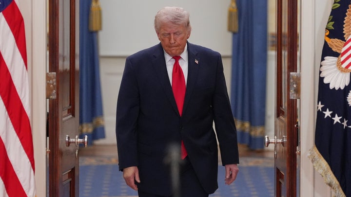 WASHINGTON, DC - APRIL 1: U.S. President Donald Trump arrives to address the nation from the Cross Hall of the White House on April 1, 2026 in Washington, DC. Trump used the prime-time address to update the nation on the war in Iran.