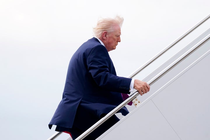 U.S. President Donald Trump boards Air Force One at Palm Beach International Airport on March 29, 2026 in West Palm Beach, Florida. (Photo by Nathan Howard/Getty Images)