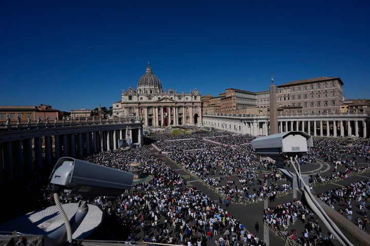 Crowds pack St. Peter's Square for Easter Mass on Sunday.