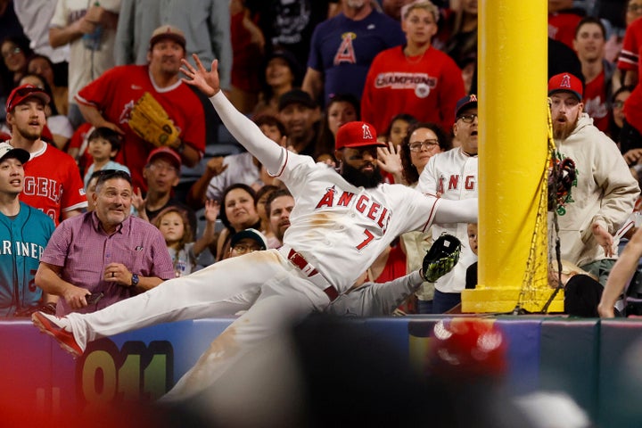 Los Angeles Angels left fielder Jo Adell (7) catches a ball hit by Seattle Mariners' J.P. Crawford during the ninth inning of a baseball game on Saturday in Anaheim, California.