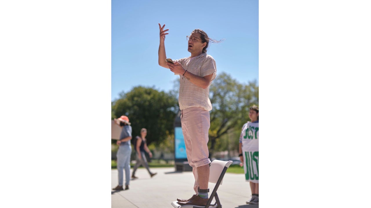 Jonathan Caravello speaking at a rally on campus.