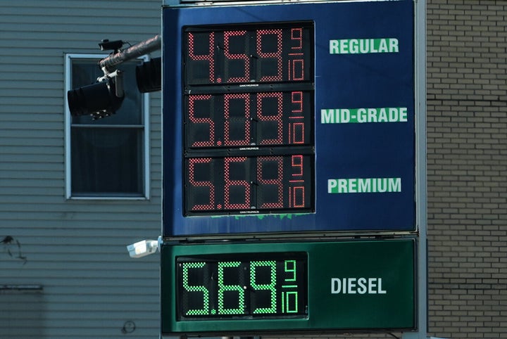 Prices are displayed at a gas station in Chicago, Monday, April 6, 2026. (AP Photo/Nam Y. Huh)
